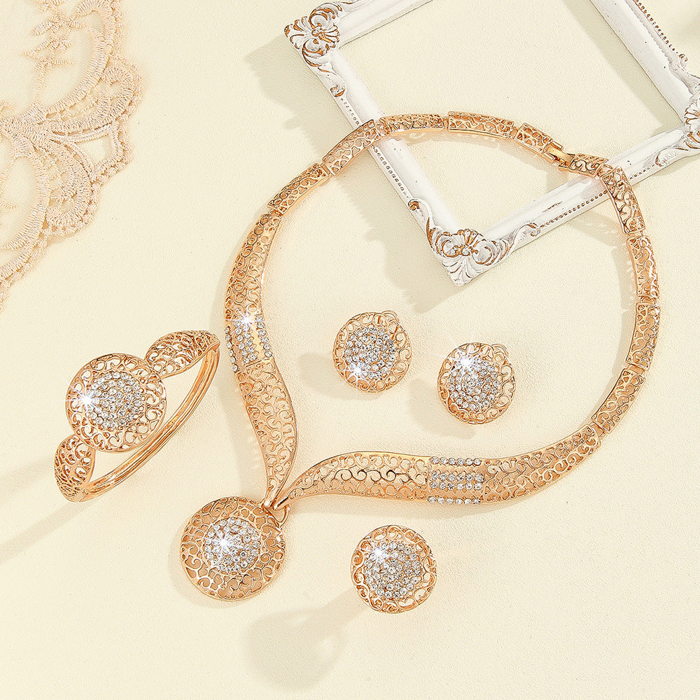 Exaggerated Rhinestone Floral Jewelry Set – 4-Piece Gold Statement Collection