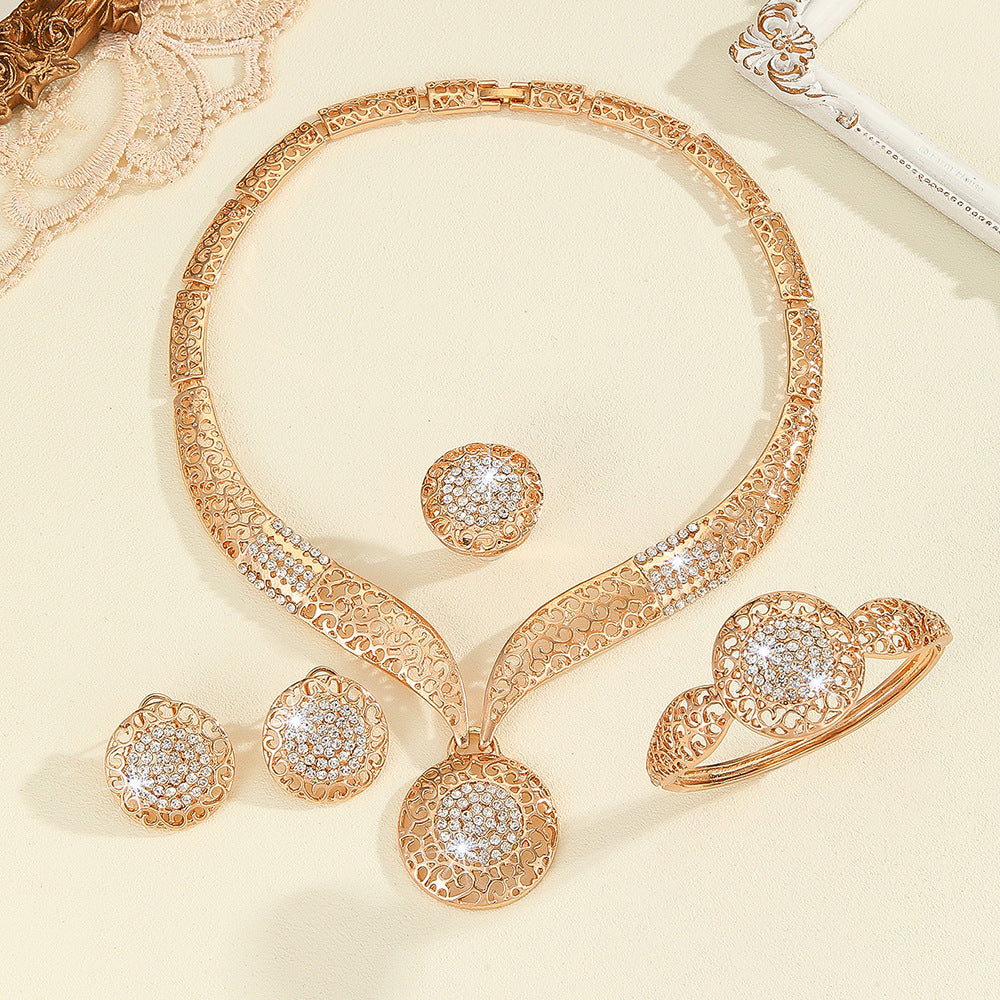 Exaggerated Rhinestone Floral Jewelry Set – 4-Piece Gold Statement Collection