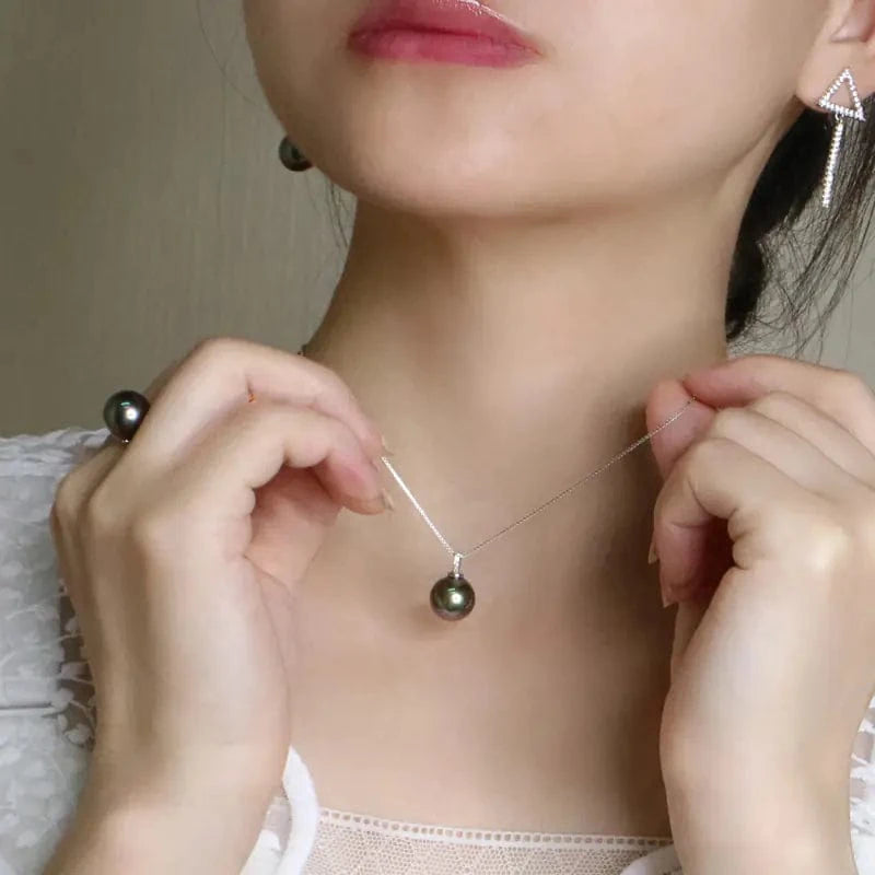 Maricel Long Black Pearl Necklace with White Freshwater Pearl Pendant